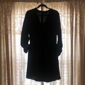 Black cinch waist dress with button top